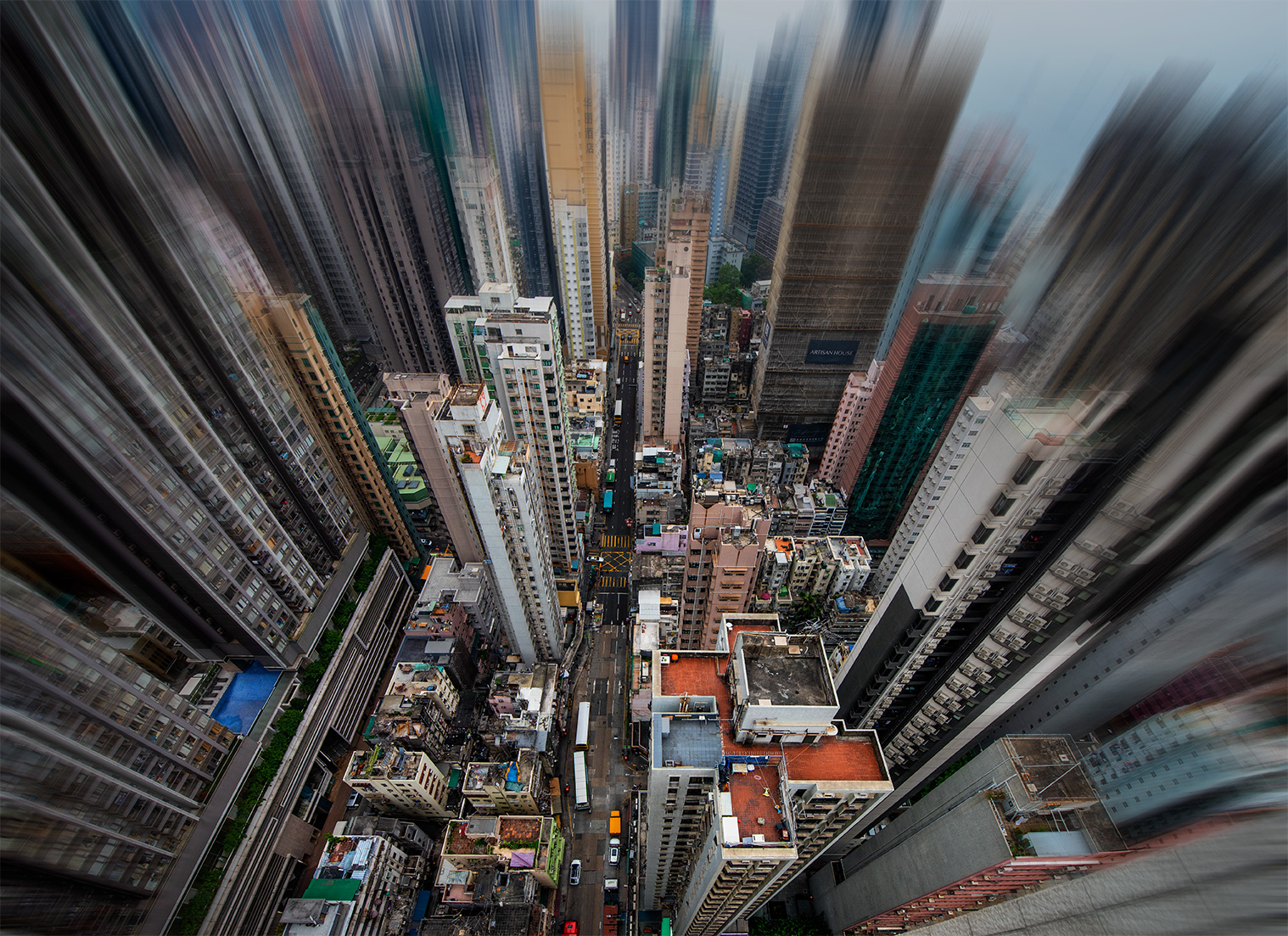 Aerial image looking down from above the heights of Hong Kong's skyscrapers