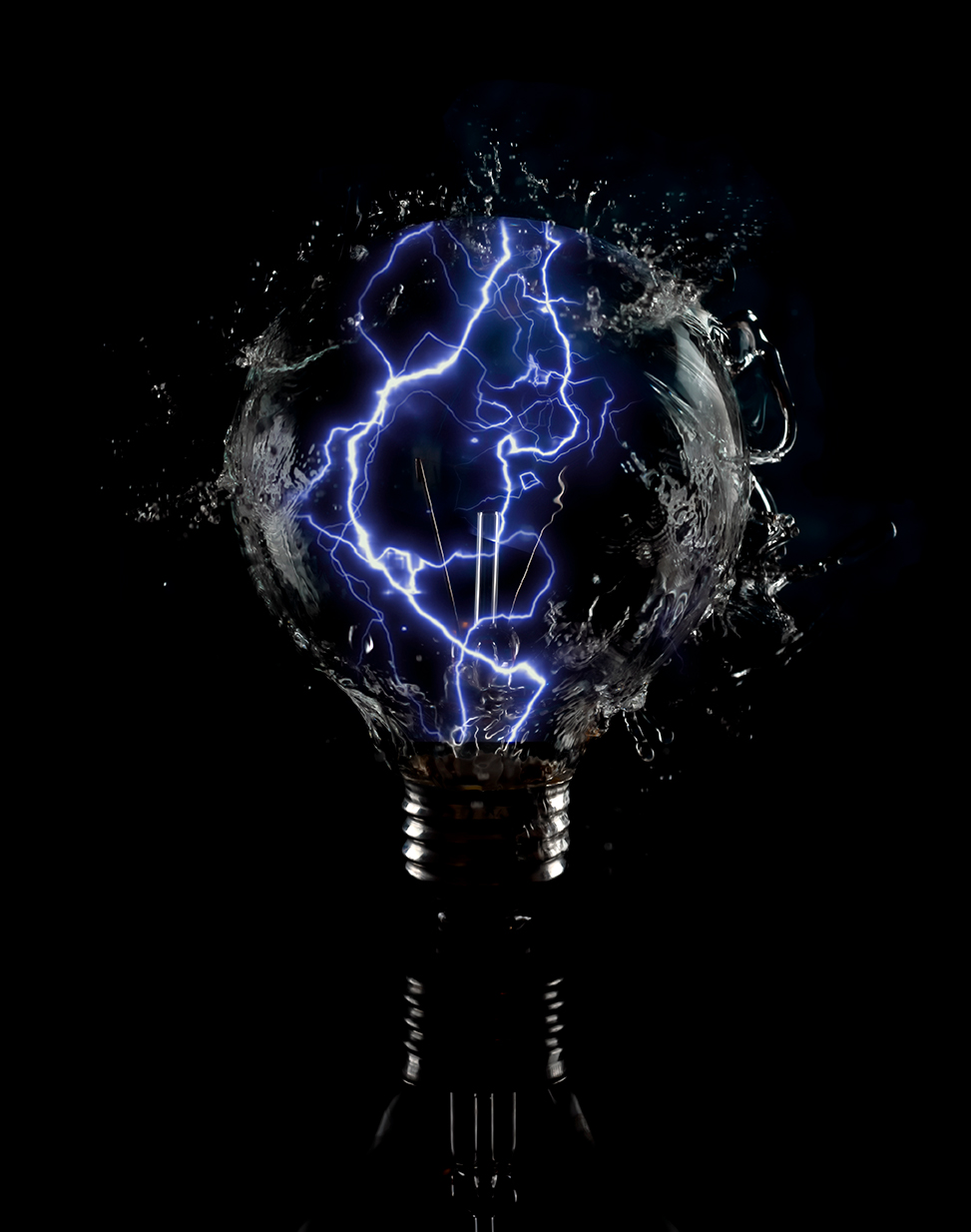 lightning in a lightbulb - conceptual studio photograph